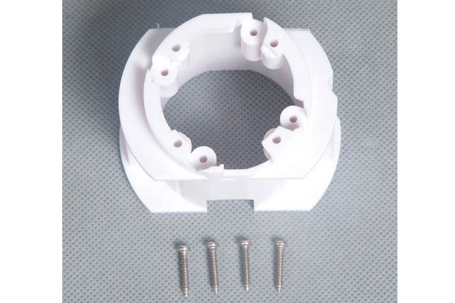 White FMSBMX012 motor board with screws for RC vehicle assembly.