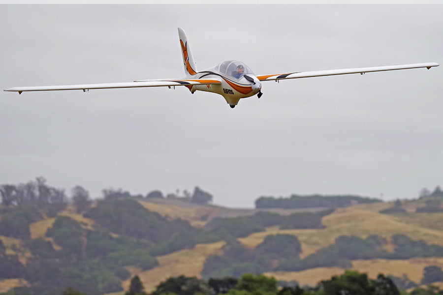 FMS 3000mm Fox aerobatic glider flying with orange fox graphic and white wings
