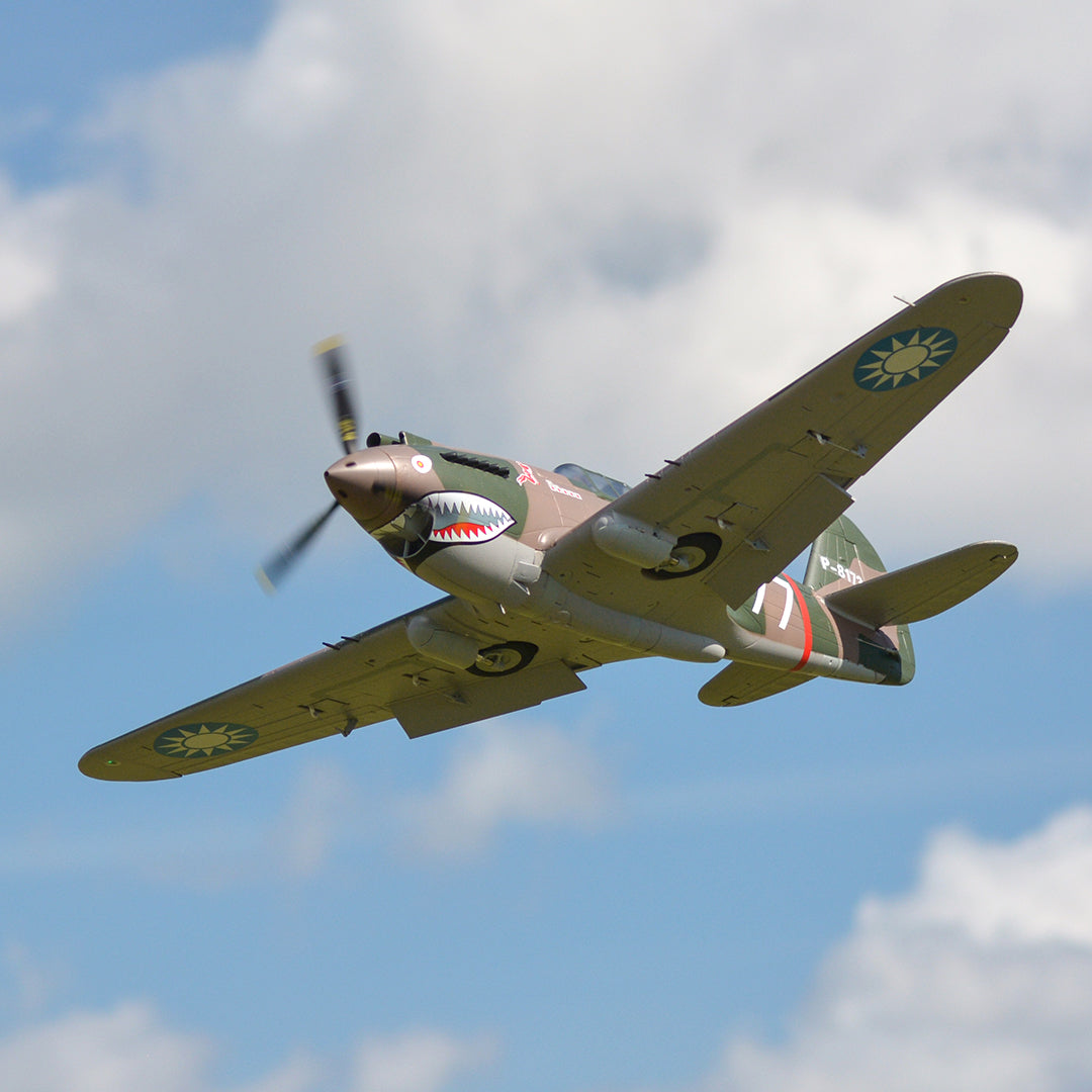 FMS 1400mm P-40B Warhawk Flying Tiger PNP RC airplane in flight with shark mouth detail.