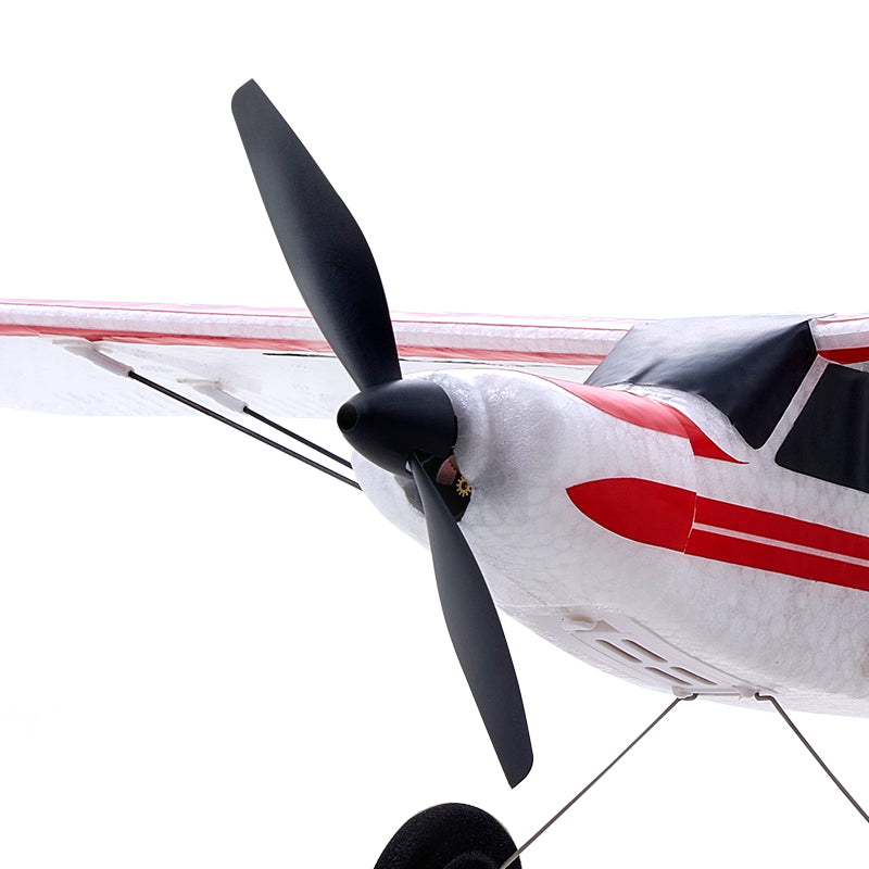 FMS 500mm PA-18 Super Cub RC plane, white with red stripe detail, black propeller
