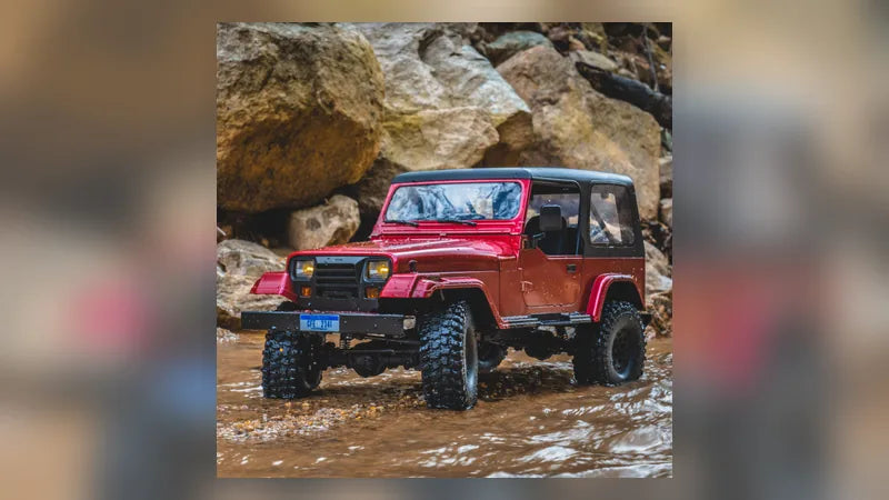 ROCHOBBY 1:10 Mashigan 4WD RC rock crawler navigating rough outdoor terrain by Fmshobby.