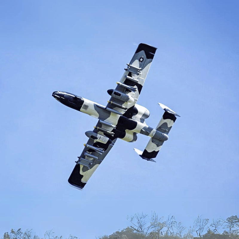 FMS A-10 Thunderbolt II V2 PNP jet with twin 70mm EDFs flying against a clear blue sky.
