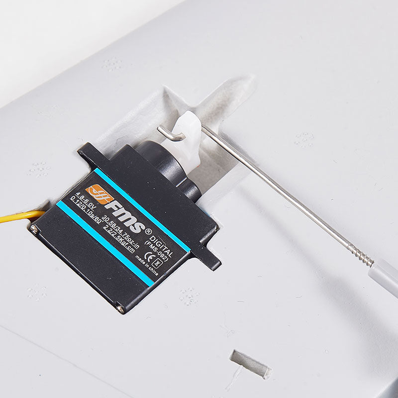 FMS 9g digital metal gear servo (FMS-092) with control rod for RC airplane.