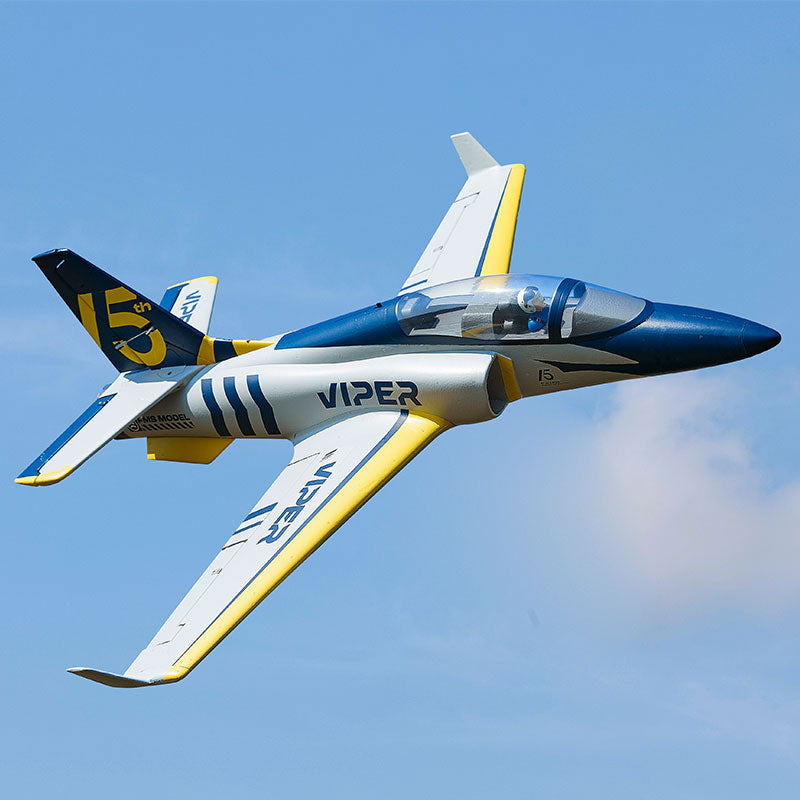 FMS 70mm Viper V2 EDF Jet 15th Anniversary Edition in flight, white with blue/yellow accents. Features 'VIPER' and '15th Anniversary' graphics.