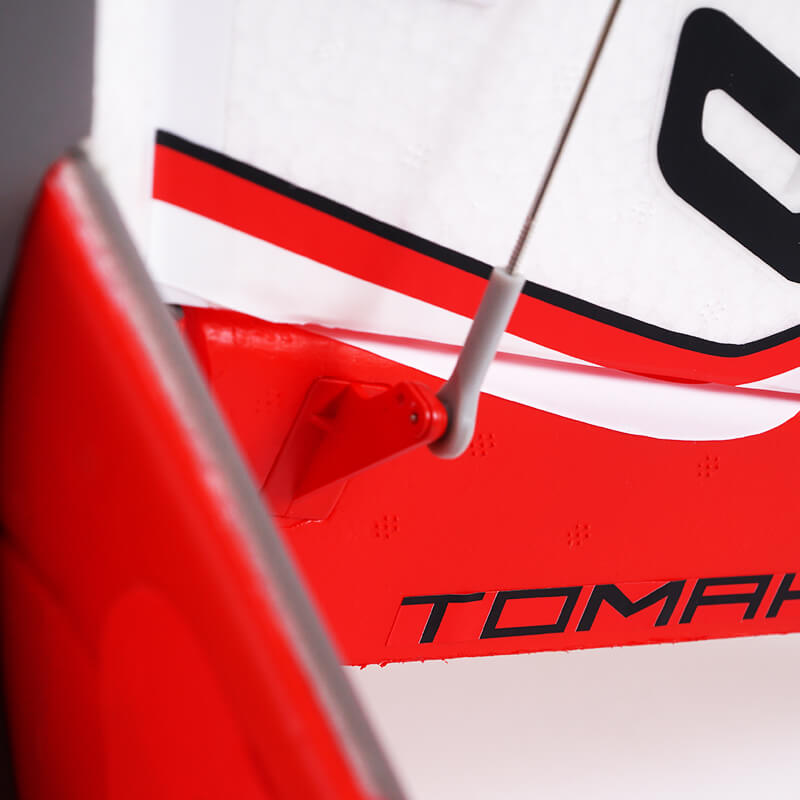 FMS EDF Jet 80mm Futura V3 PNP wing detail with 'TOMAH' logo and control rod