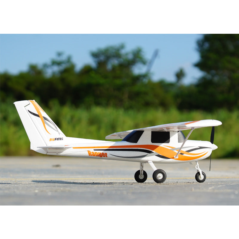 FMS 850mm Ranger RC airplane, white with orange accents, PNP/RTF model with tricycle landing gear.