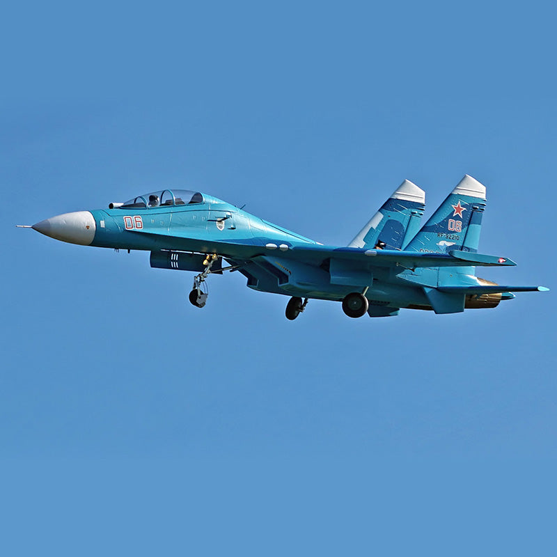 FMS SU-27 fighter jet in flight showcasing detailed blue and white livery