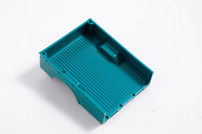 Green 1:12 Toyota FJ45 Hopper RC truck bed with ribbed texture.