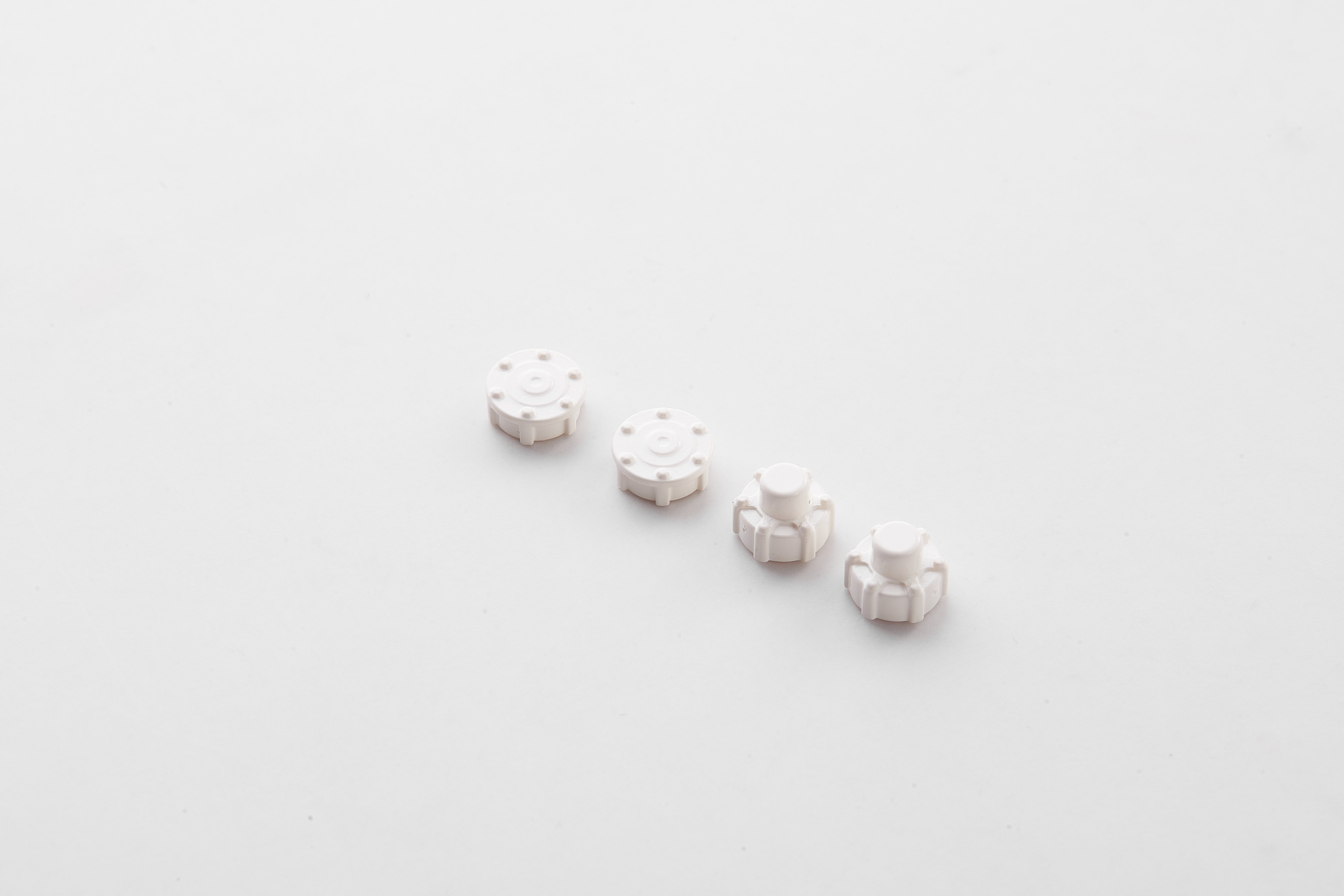Set of four white wheel covers for 1:12 scale RC Land Rover models