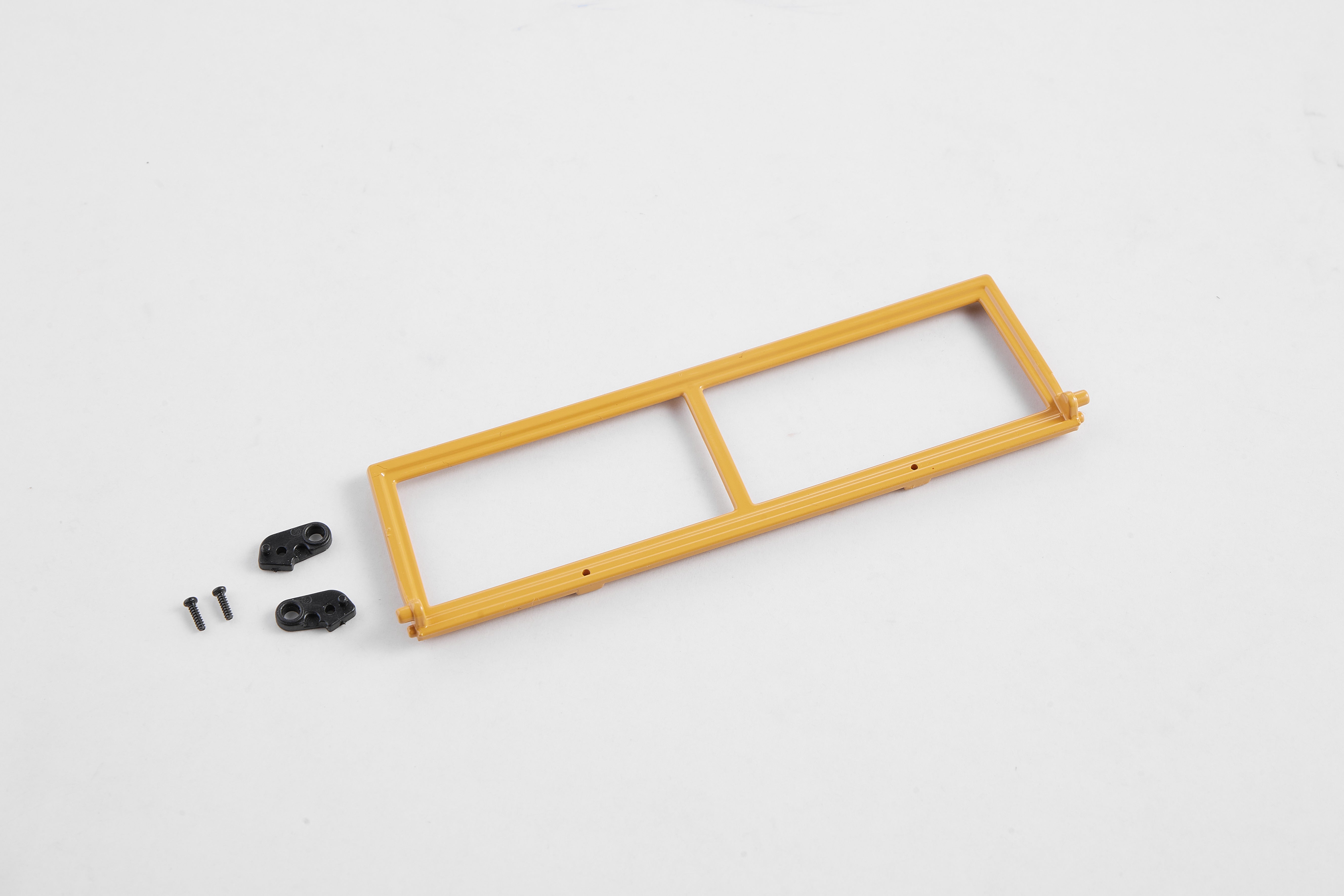 Yellow 1:12 Land Rover model window frame with hardware.