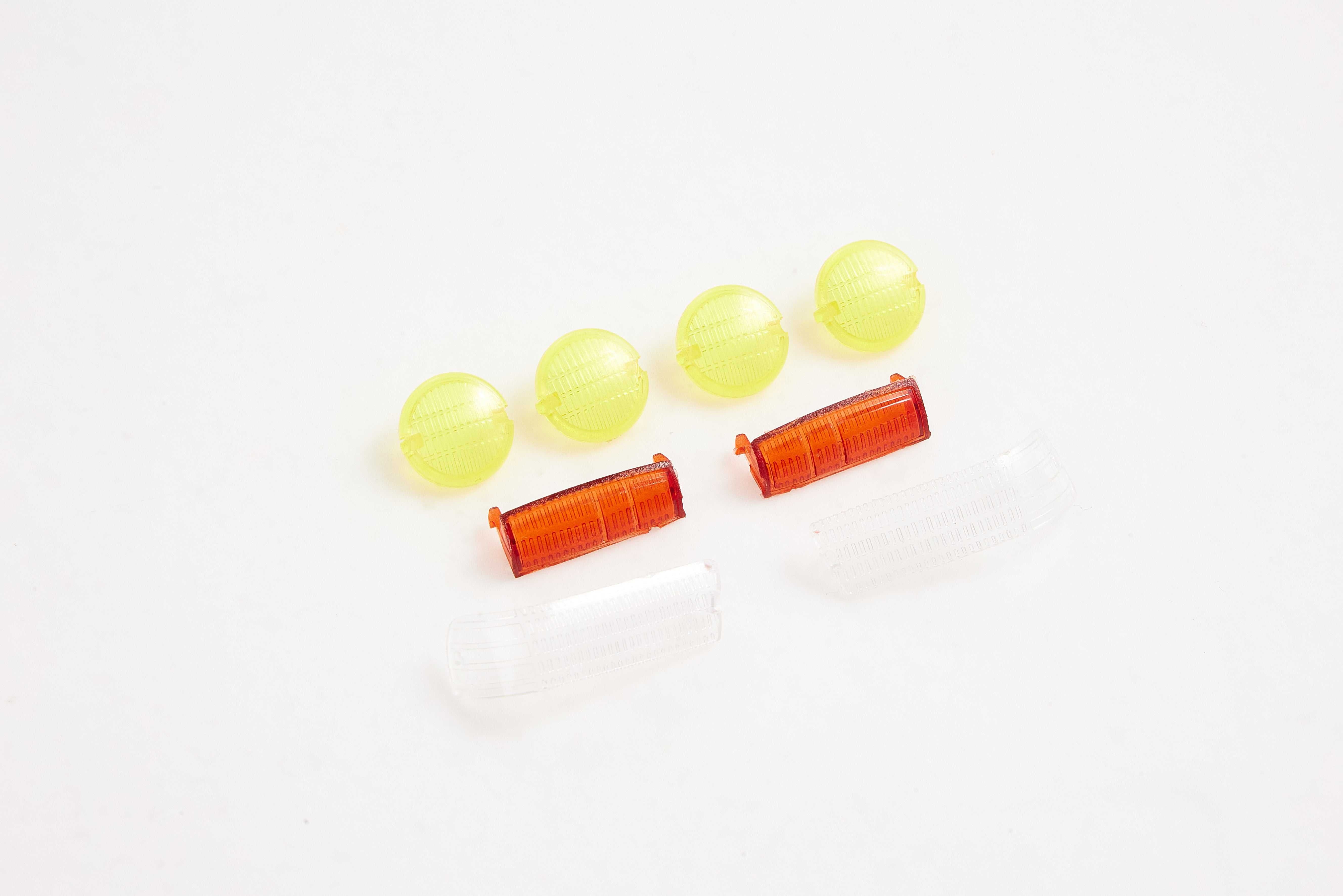 Lens parts for FCX18 Land Cruiser 80, including yellow and red lenses