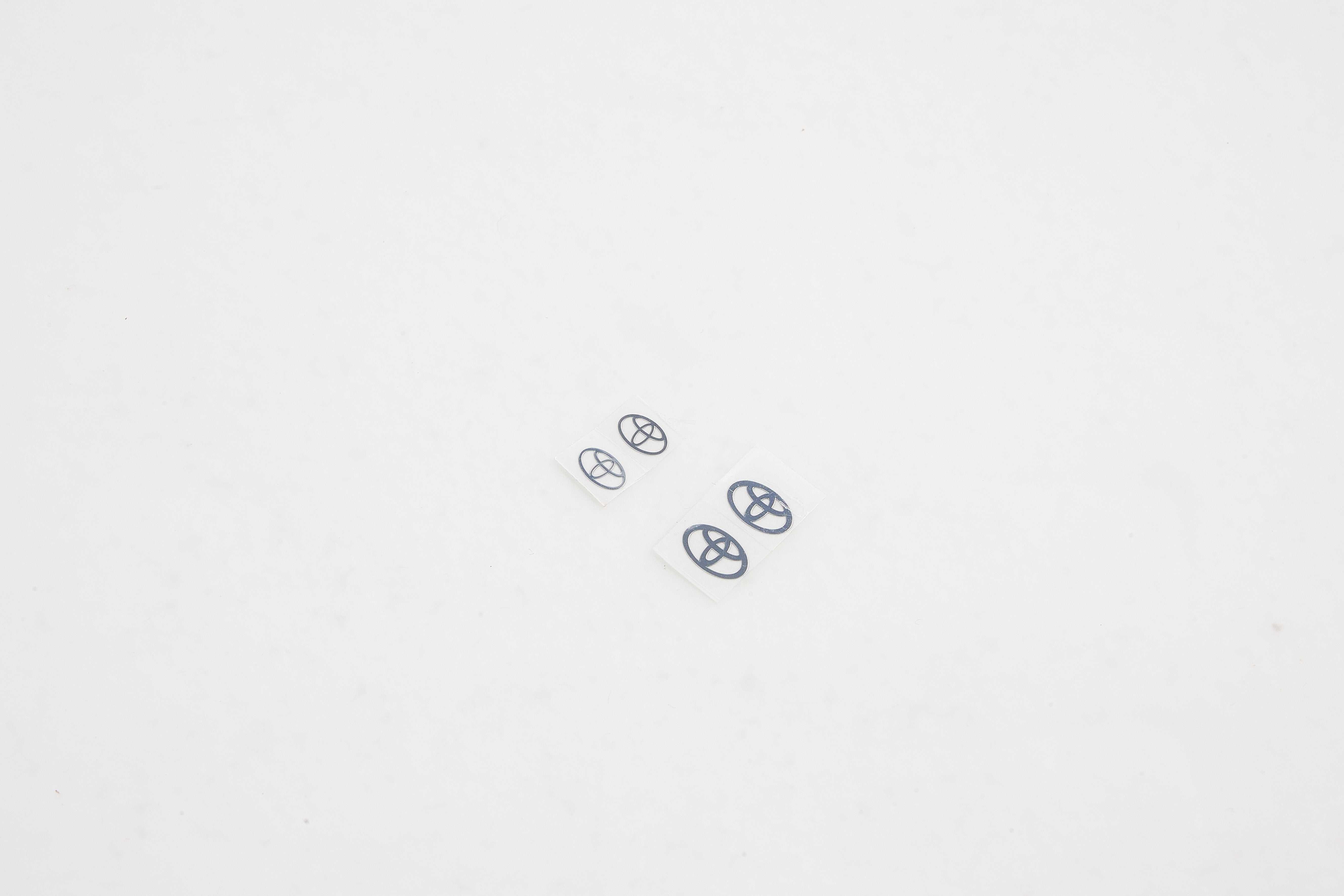Logo plate decals for FCX18 Land Cruiser 80 in multiple sizes.