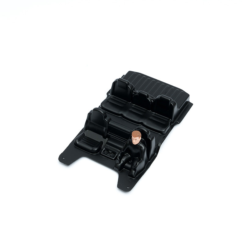 Upgrade seat compartment with figure for FCX24M RC model accessories.