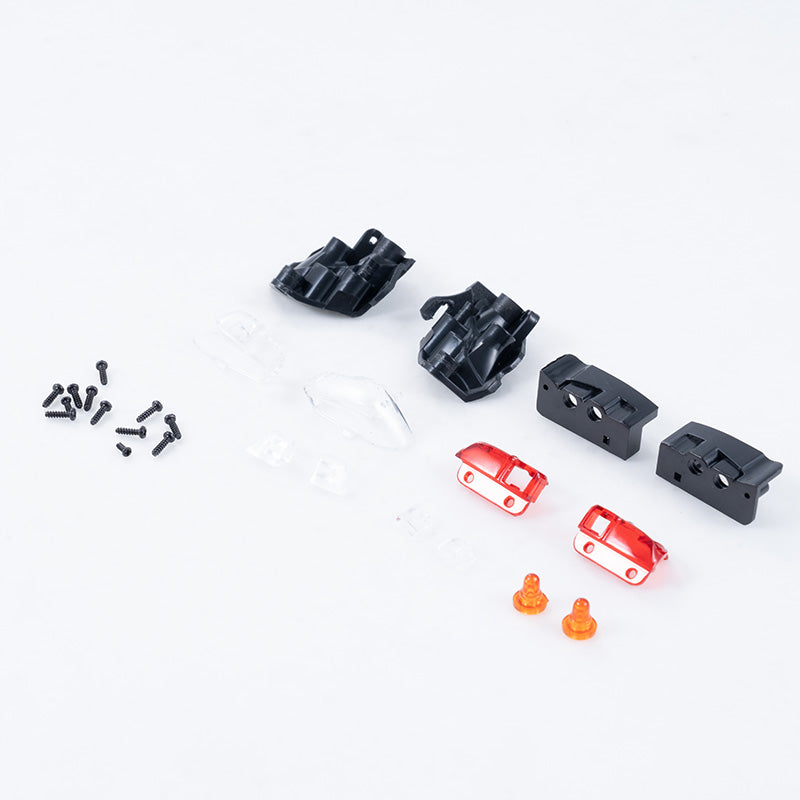 1:24 Tacoma light cup set components: black housings, clear lenses, red/orange lights.