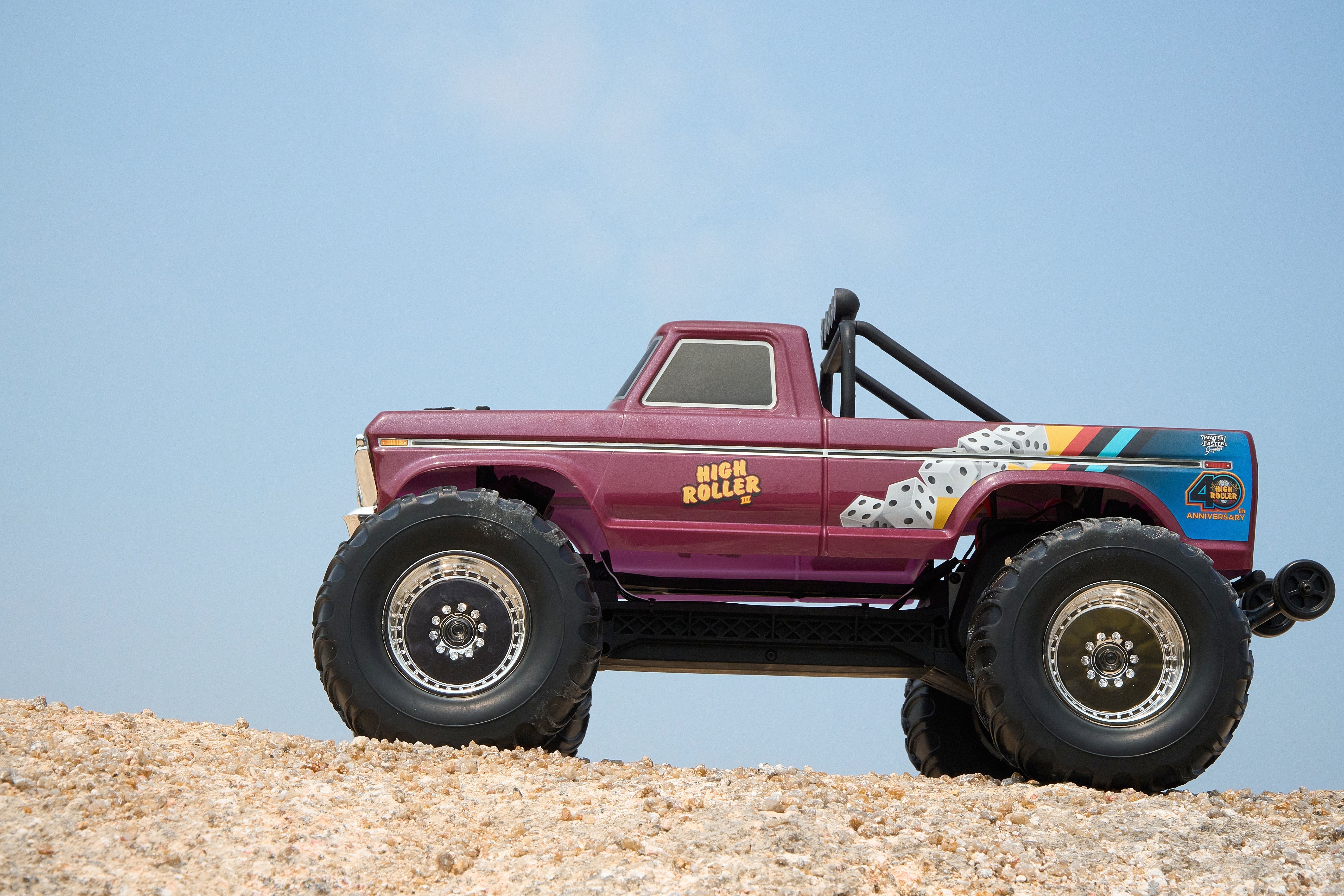 Side view of purple RC monster truck