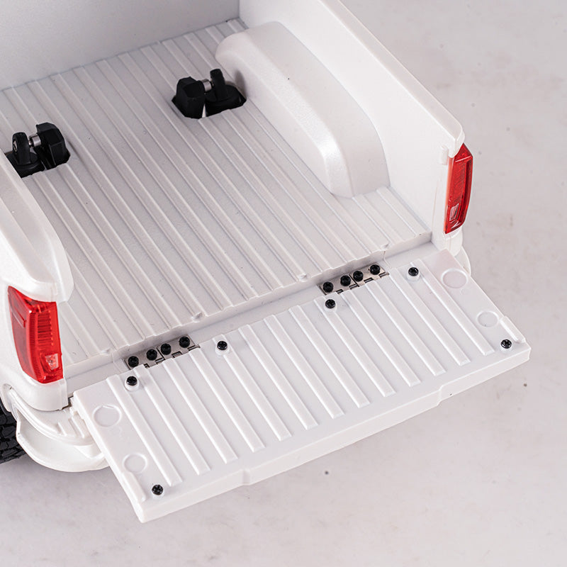 1:18 GMC Sierra S RTR white RC truck bed with open tailgate and tie-downs.