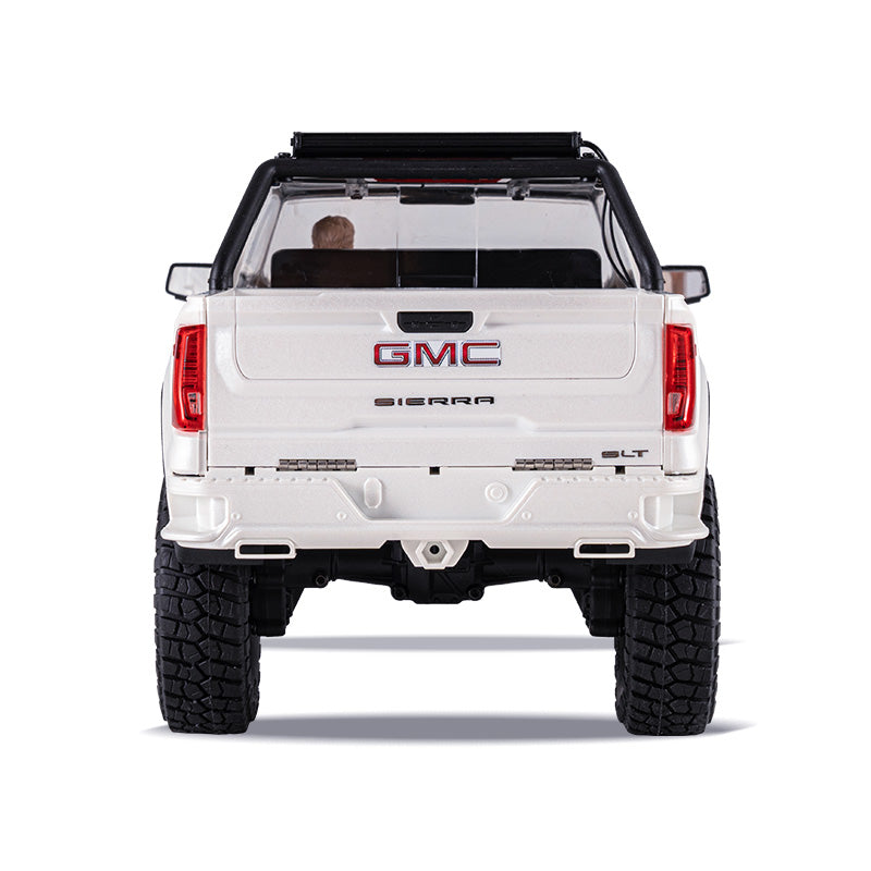 White 1:18 GMC Sierra S RTR Brushless RC truck rear view with off-road tires.