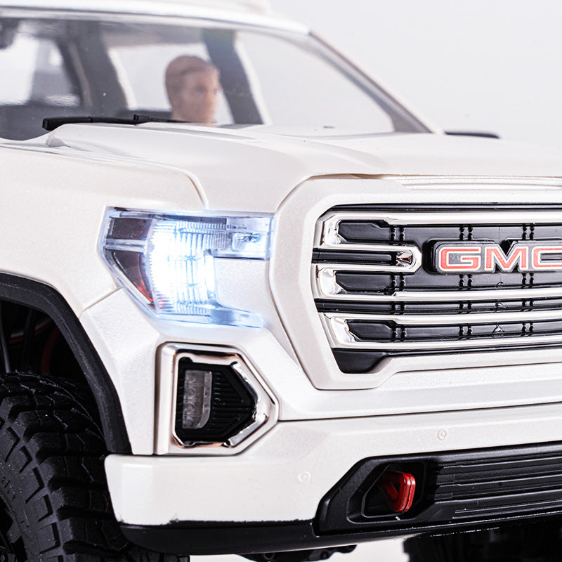 1:18 GMC Sierra S RTR white RC truck front with illuminated headlights.