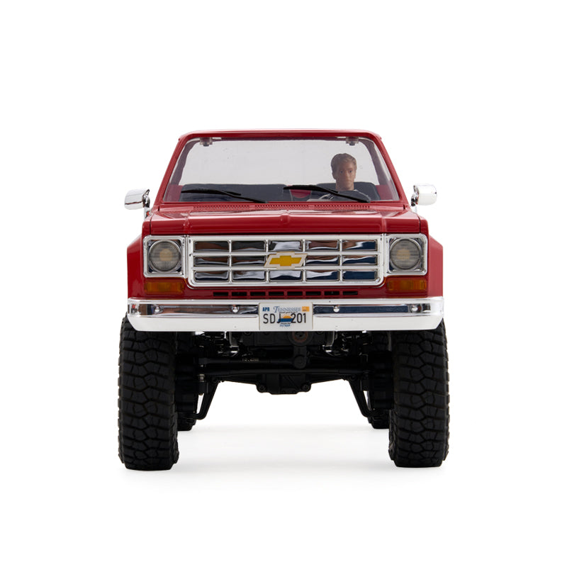 FMS 1:18 FCX18 Chevrolet K10 V2 RTR red RC truck with detailed grille and driver