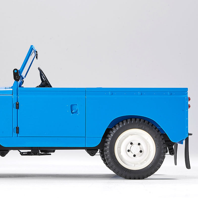 FMS 1:12 Land Rover Series II RTR in blue, showcasing realistic details and off-road tire.