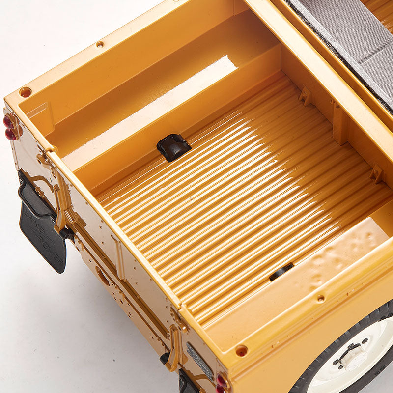 Yellow FMS 1:12 Land Rover Series II RTR model truck bed with ribbed floor detail