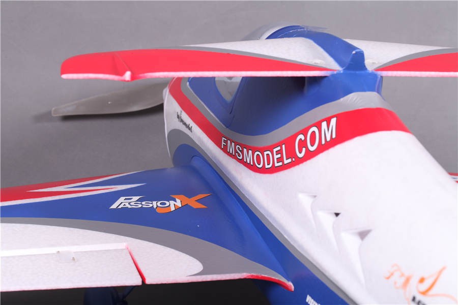 FMS 1400mm F3A Olympus PNP RC airplane with PassionX branding and FMSMODEL.COM logo.