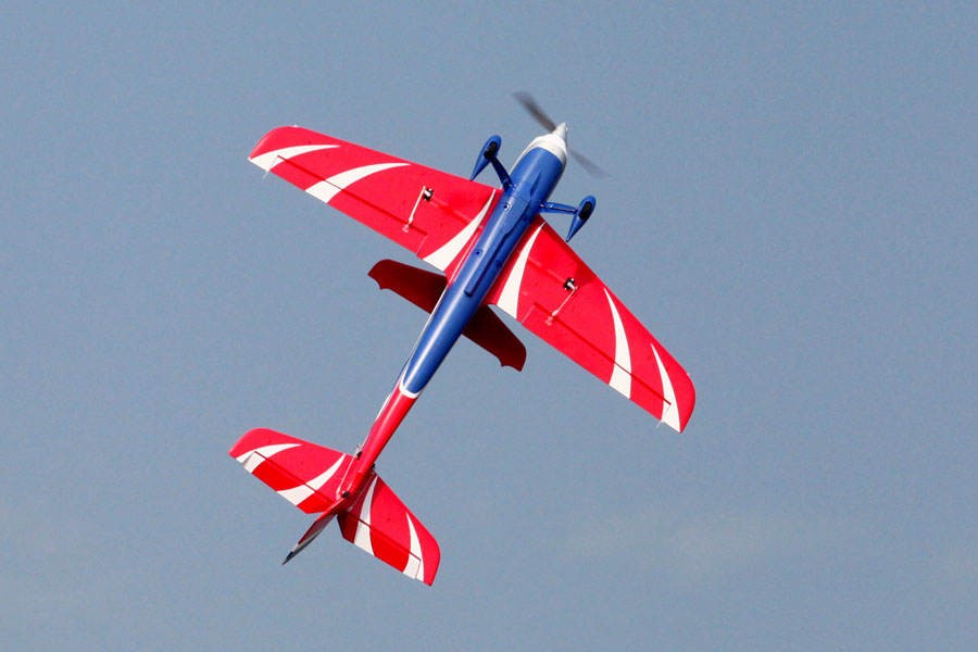 FMS 1400mm F3A Olympus PNP aerobatic RC plane in flight, red and white design
