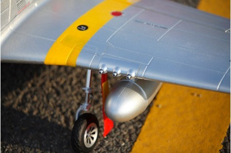 Silver FMS 1450mm P-51D Red Tail V8 RC airplane wing detail with yellow stripe and landing gear.