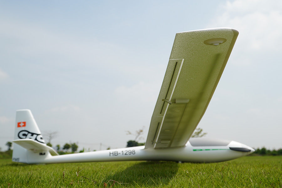 FMS 2500mm ASW-17 EP Glider PNP RC airplane on grass, white fuselage, Swiss flag tail emblem