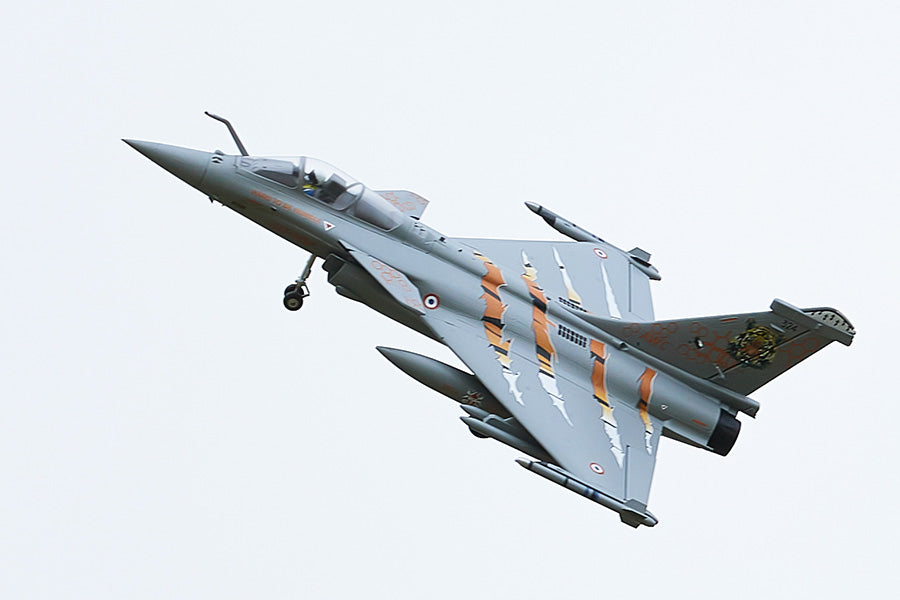 FMS 64mm Rafale EDF jet with tiger livery, in flight with landing gear down