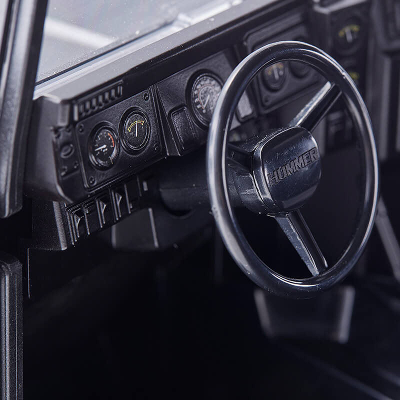 FMS 1:12 Hummer H1 Alpha RTR interior with detailed dashboard and steering wheel