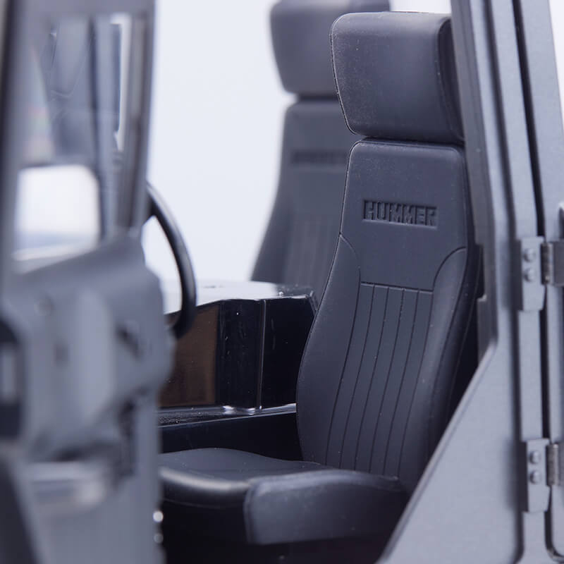 FMS 1:12 Hummer H1 Alpha RTR interior, black seats with "HUMMER" embossed