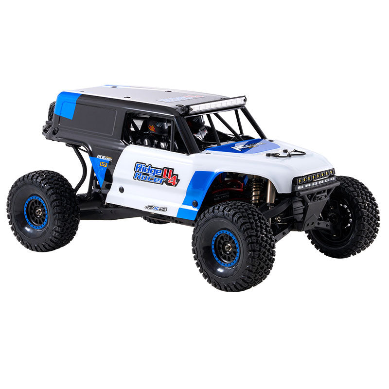 ROCHOBBY 1:7 Ridge Racer U4 desert buggy RC car, white with blue accents, large off-road tires, light bar.