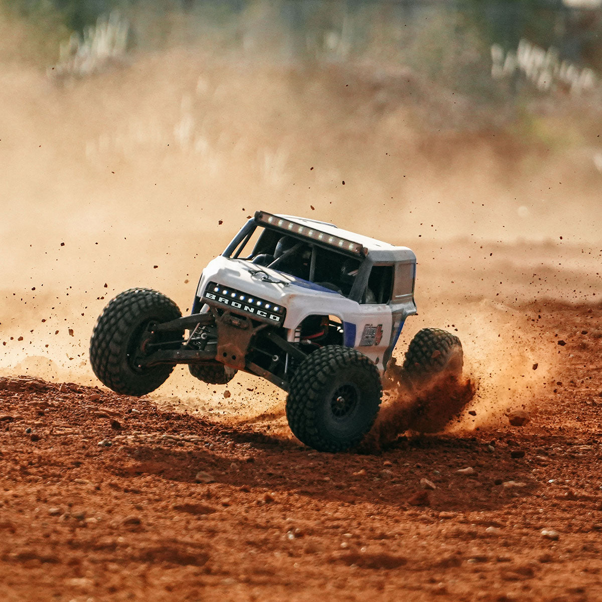 ROCHOBBY 1:7 Ridge Racer U4 Desert Buggy RS kicking up dirt while in motion.