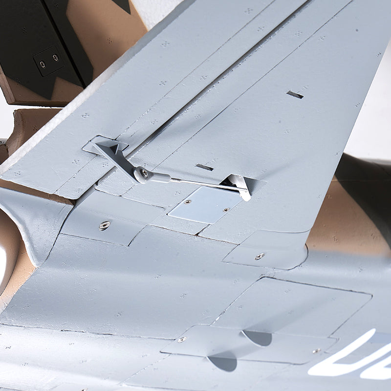 FMS 90mm Super Scorpion V2 EDF jet tail detail showing rudder and elevator linkages, camouflage paint scheme