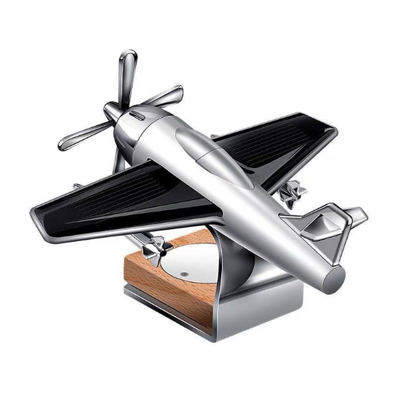 Silver and black airplane model with wooden and metal base display