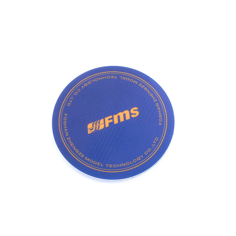 FMS logo coaster in blue with orange text and company name around the edge