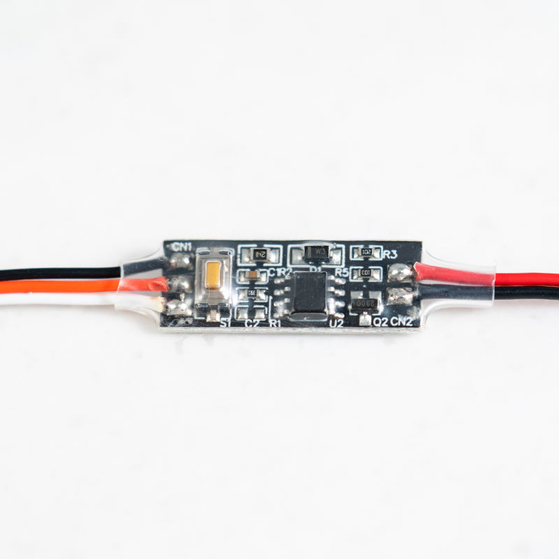 Compact LED light strip circuit board with red, black and orange wires