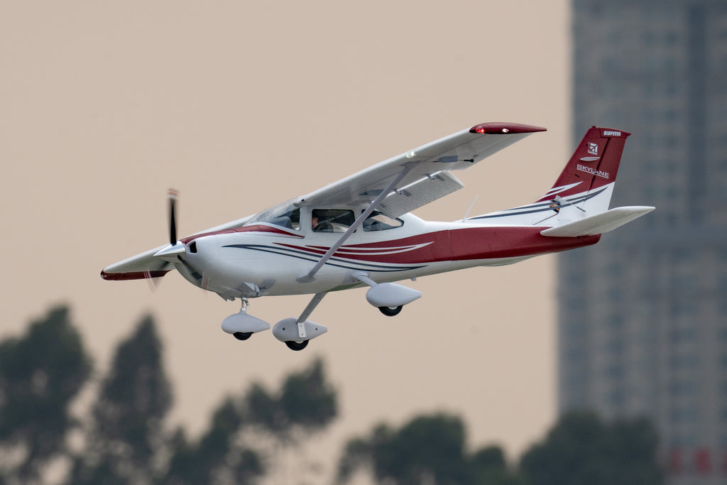 RC plane flying in the sky.