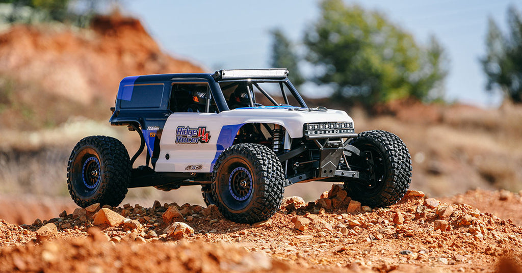 Bronco RC crawler on rugged landscape
