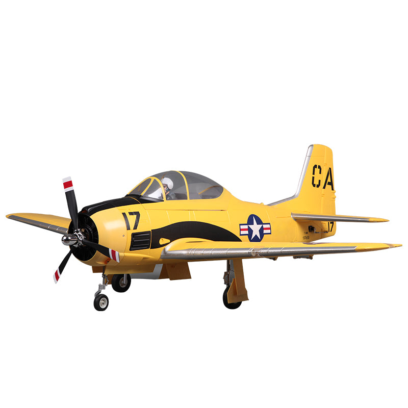 Yellow FMS 1400mm T-28D Trojan V4 model airplane with black accents, pilot, and US Navy insignia.