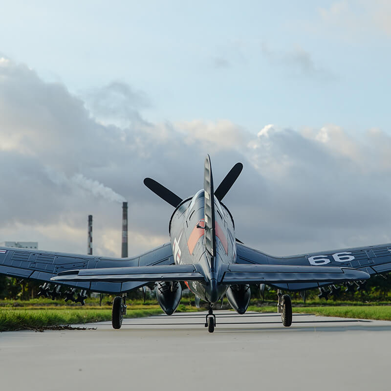 FMS 1700mm F4U Corsair V3 PNP model airplane on runway, rear view with landing gear down.