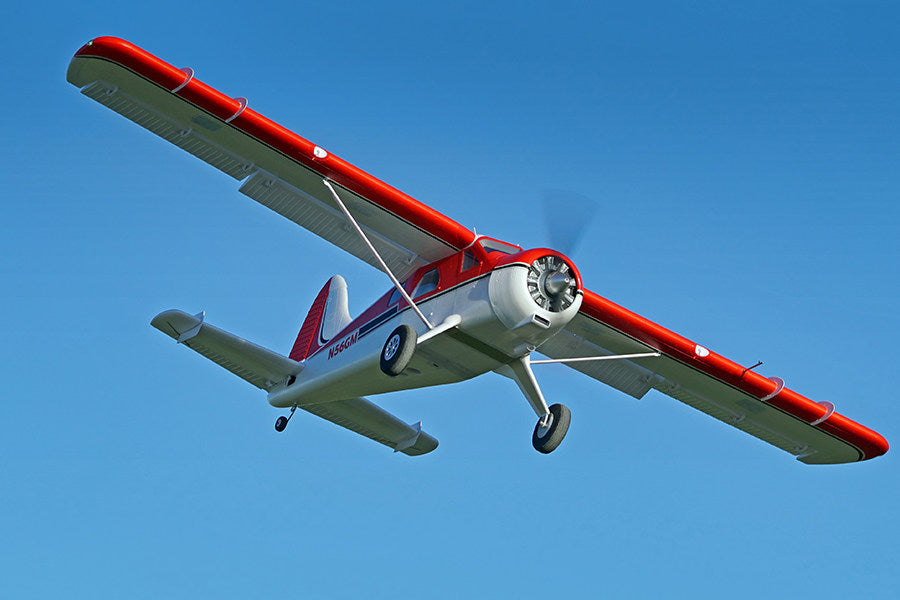 FMS 2000mm Beaver V2 Seaplane PNP flying against blue sky with registration N56GM