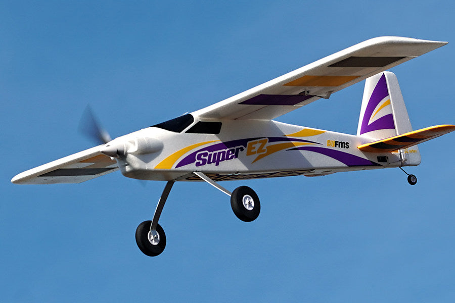 FMS 1220mm Super EZ V4 airplane in flight with purple and yellow accents