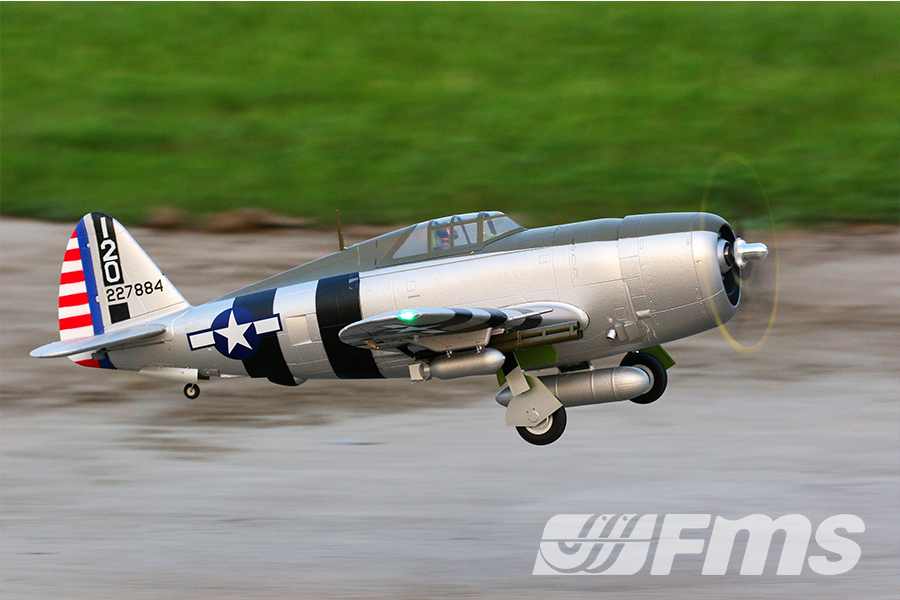 FMS 1500mm P-47 Thunderbolt Bonnie PNP RC airplane in flight with detailed markings and landing gear extended.