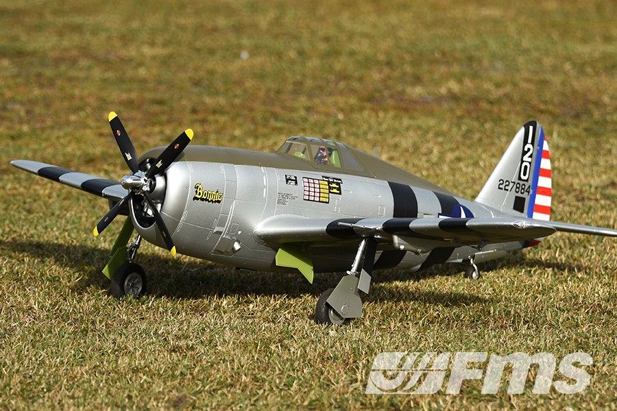 FMS 1500mm P-47 Thunderbolt Bonnie PNP RC airplane with scale detail, propeller, and landing gear on grass.