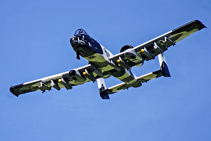 FMS 70mm A-10 Thunderbolt II V2 PNP model jet in flight with shark mouth detail and missiles.