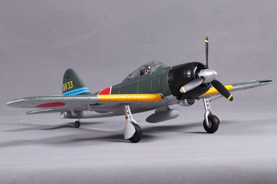 FMS 800mm Zero A6M3 V2 PNP RC airplane, dark green with red markings, yellow stripe, and '33' tail number.