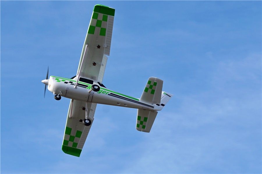 FMS 1800mm Ranger PNP remote control airplane in flight, white with green checks