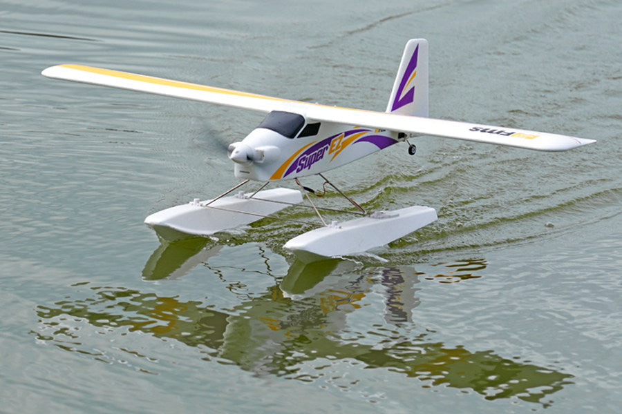 FMS 1220mm Super EZ V4 seaplane on water with floats, ready for flight.